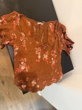 Reformation Burnt Orange Floral Smocked Blouse